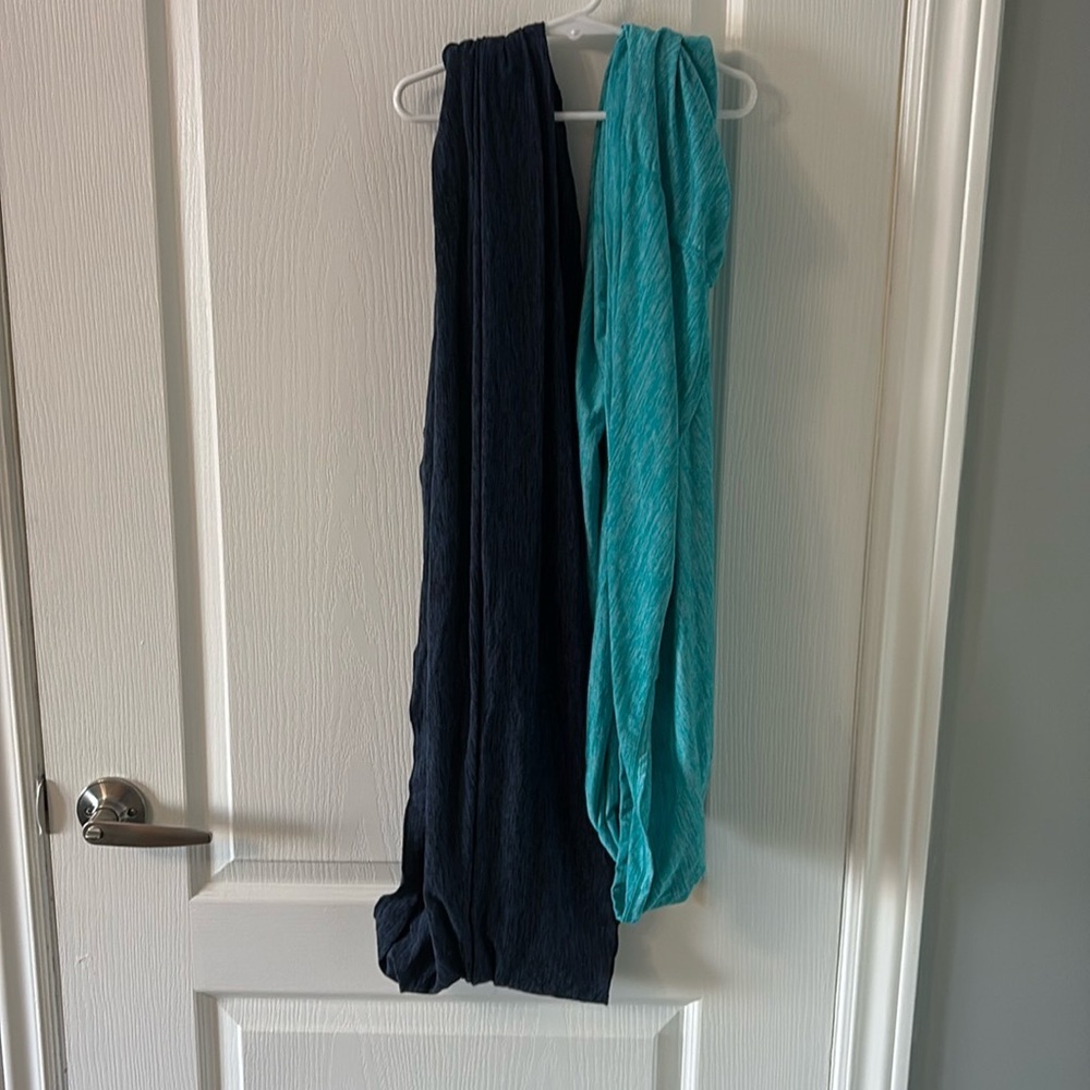 Two blue infinity scarves